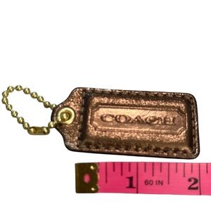 Coach Bronze 2 1/4” Hang Tag